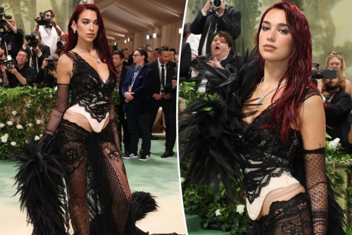 Dua Lipa sizzles in a skin-baring Marc Jacobs gown on the 2024 Met Gala red carpet