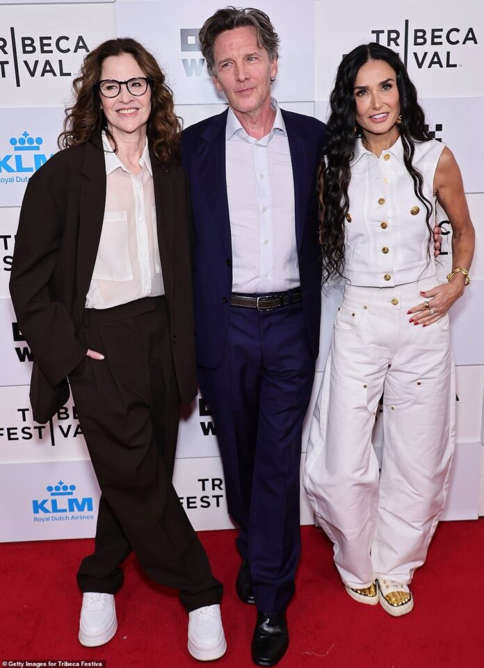 Demi Moore (right) reunited with her fellow Brat Pack members Ally Sheedy (left) and Andrew McCarthy Center) at the Tribeca premiere of their documentary Brats on Friday