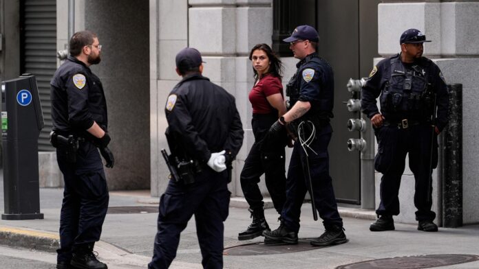 Police detain pro-Palestinian demonstrators inside San Francisco building housing Israeli Consulate