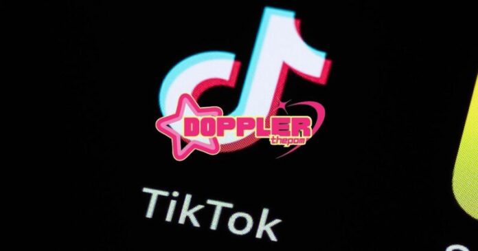 A TikTok logo on a phone screen.