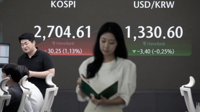 Asian markets mostly rise after Wall Street extends its winning streak to longest of the year