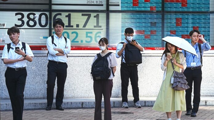 Asian stocks mixed after Wall Street rallies as ‘time has come’ for rate cuts