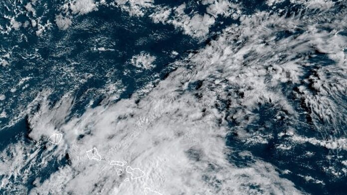 Hone swirls past Hawaii’s main islands after dumping enough rain to ease wildfire fears