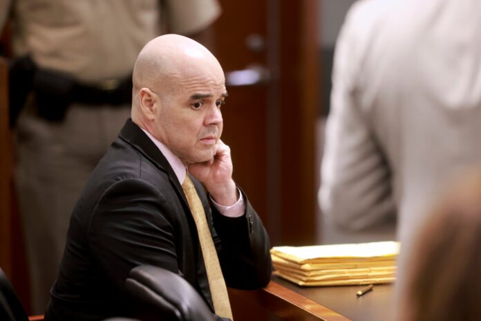 Robert Telles waits for proceedings to begin during his murder trial at the Regional Justice Center in Las Vegas, Friday, Aug. 23, 2024. Telles, a former Clark County public administrator, is charged in the murder of Las Vegas Review-Journal investigative journalist Jeff German. (K.M. Cannon/Las Vegas Review-Journal via AP).