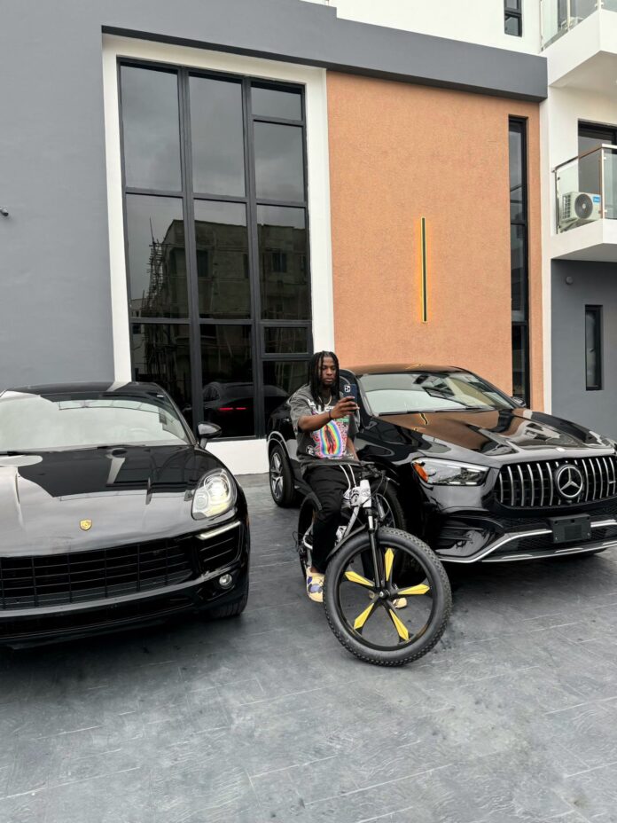 PHOTO: Owner of Gossipmill Naija, Somto Pino Vibes, revealed his real face after he bought his 2024 GLE SUV and a new house with elevator