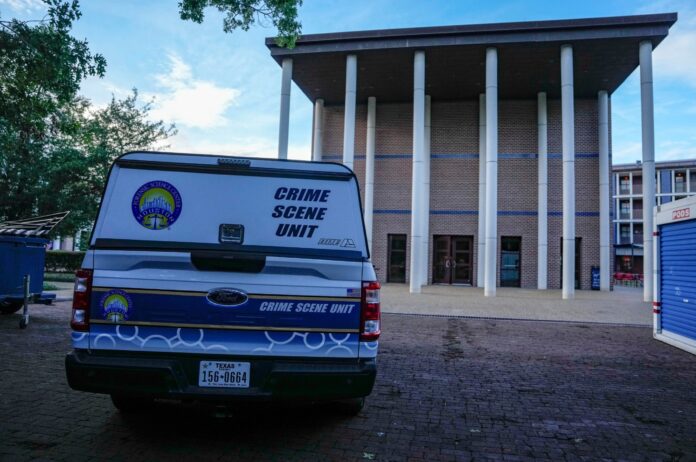 A police crime scene unit vehicle sits parked after an apparent murder-suicide at Jones College, a residential college at Rice University, according to authorities Monday, Aug. 26, 2024, in Houston. (Raquel Natalicchio/Houston Chronicle via AP).