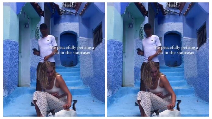 VIDEO: French Tourist sexually harassed by Moroccan man who forcibly tried to kiss while petting her cat on the stairs at Chefchaouen Street in Morocco