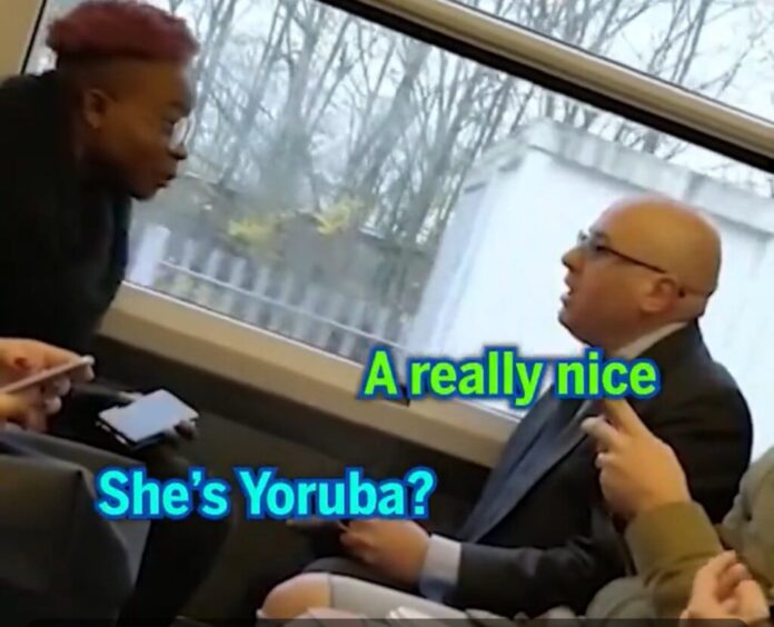 VIDEO: Ifeoma Amarachi Okonma is the Nigerian woman threatening to slap a white man whom she put her feet on his seat on a train in the UK