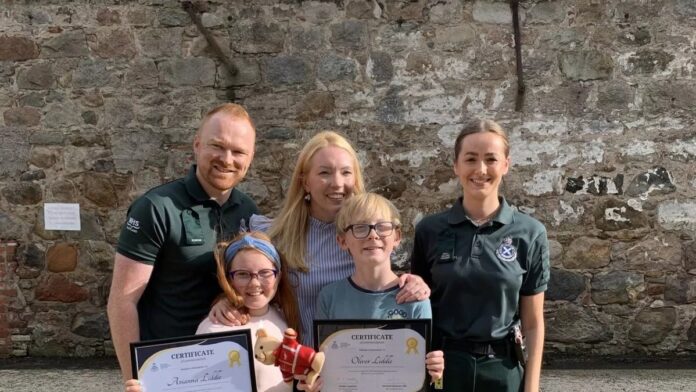 Brave children save mum's life after heart attack