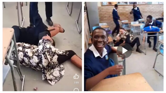 FIGHTING VIDEO: Outrage in South Africa as grade 8 black boy beat up his white teacher on the classroom floor over cellphone in HTS WELKOM THS