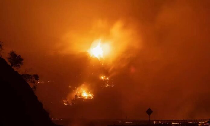 Nevada wildfires force evacuations, destroy homes