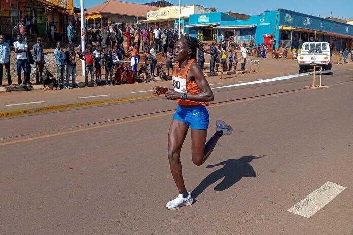 Rebecca Cheptegei, competes at the Discovery 10km road race in Kapchorwa, Uganda Friday, Jan. 20, 2023. A Cheptegei, an Ugandan athlete living in Kenya was set ablaze by her boyfriend on Sunday Sept. 1, 2024 and is currently receiving treatment for 75% burns, police said (AP Photo).