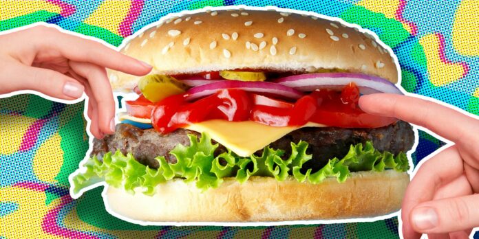 national cheeseburger day deals - Fingers pointing to cheeseburger over abstract background