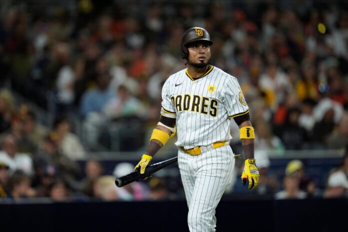 San Diego Padres' Luis Arraez walks toward the dugout after striking out during the second inning of a baseball game against the Houston Astros, Monday, Sept. 16, 2024, in San Diego. (AP Photo/Gregory Bull).