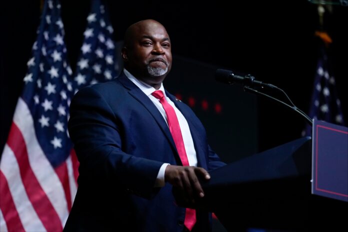 North Carolina Lt. Gov. Mark Robinson speaks before Republican presidential nominee former President Donald Trump at a campaign rally in Asheville, N.C., Aug. 14, 2024. (AP Photo/Matt Rourke, File).