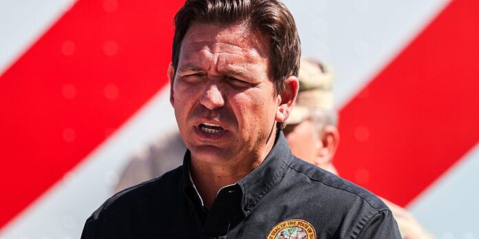 Mandatory Credit: Photo by Dirk Shadd/Tampa Bay Times/ZUMA Press Wire/Shutterstock (14752866d) Governor Ron DeSantis with the flag on a Walmart truck pictured behind him during a news conference near John's Pass Village on Wednesday, October 2, 2024 in Madeira Beach . Florida News, Madeira Beach, USA - October 2, 2024