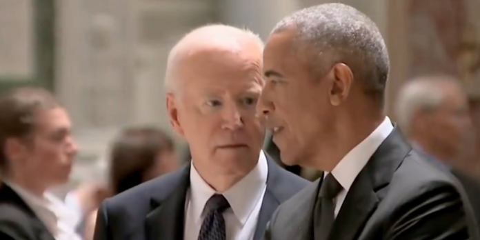 Everyone wants to know what Obama said to Biden at the Kennedy memorial service