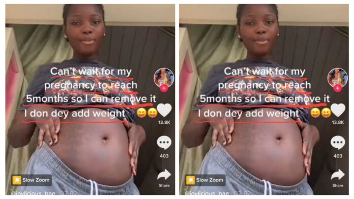 PHOTO: Pregnant woman, Joylicious Bae, set to abort her 5 months baby in her belly after it made her gain weight in viral TikTok video